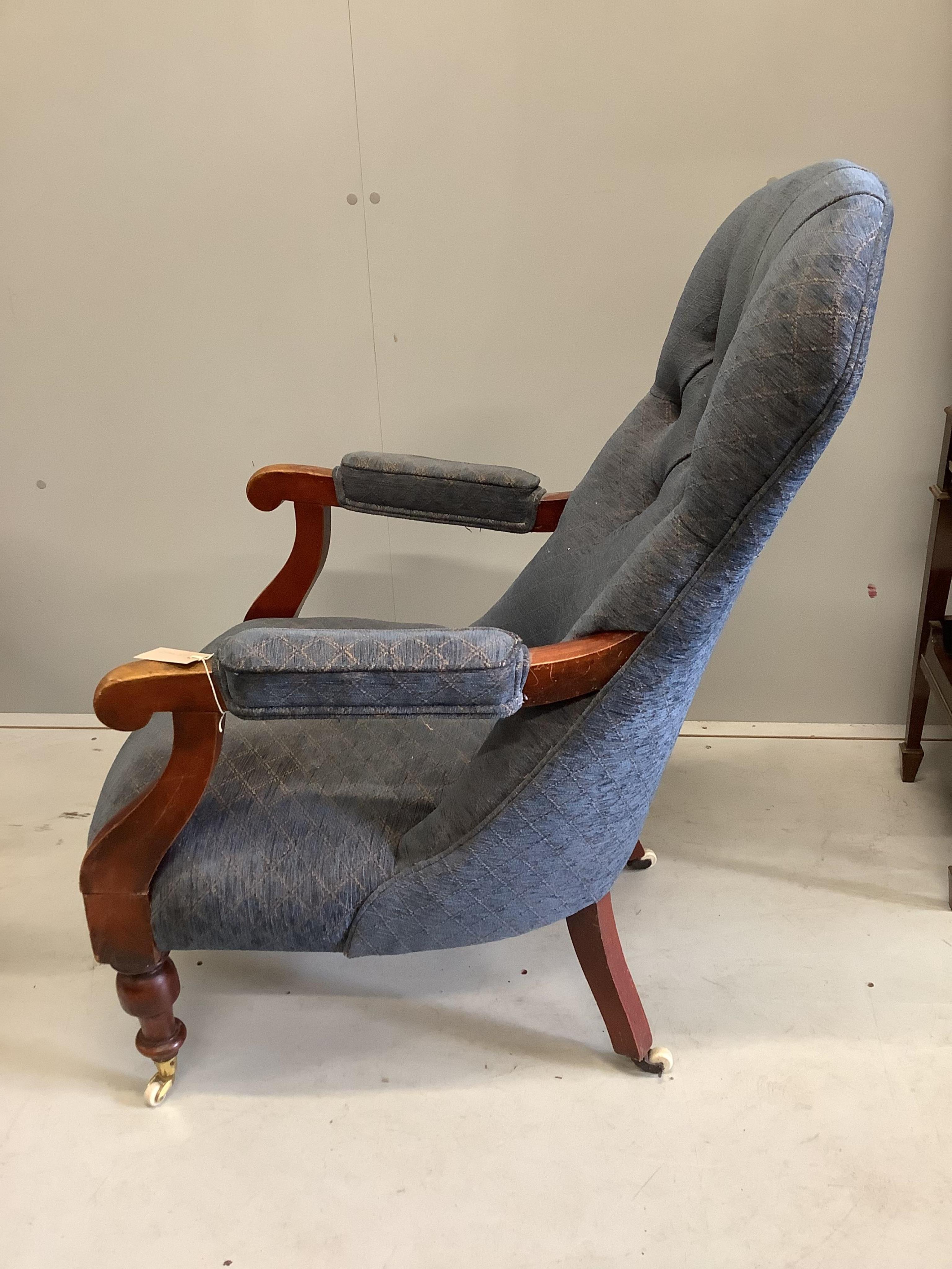 A Victorian mahogany spoon back open armchair, width 66cm, depth 68cm, height 96cm. Condition - fair